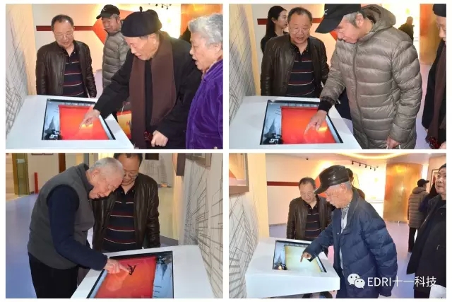 1496419643103588.jpg 老領導和大師紛紛在簽名臺前簽名.webp.jpg